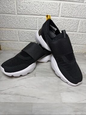 Sorel Kinetic Impact Strap Shoe: Black Slip-On Knit Sneakers with White Sole